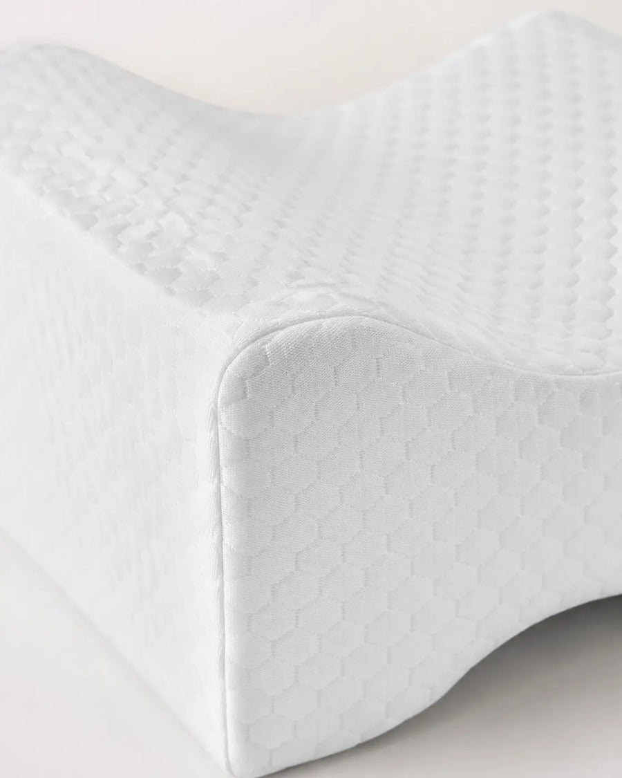 Coussin de position entre les jambes pour le lit