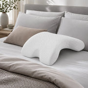Oreiller ergonomique avec passage pour le bras